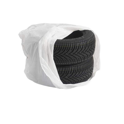 2 pneus 20x55x16 dans sac à pneus
